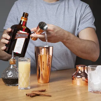<p>Combine all ingredients in a cocktail shaker</p>