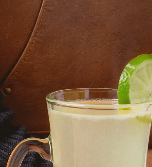 hot margarita with lime and cointreau bottle