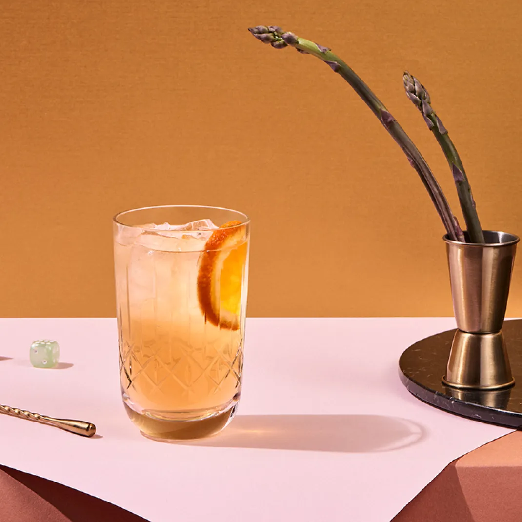 The Cointreau Noir and Ginger Ale Cocktail in a chilled highball glass