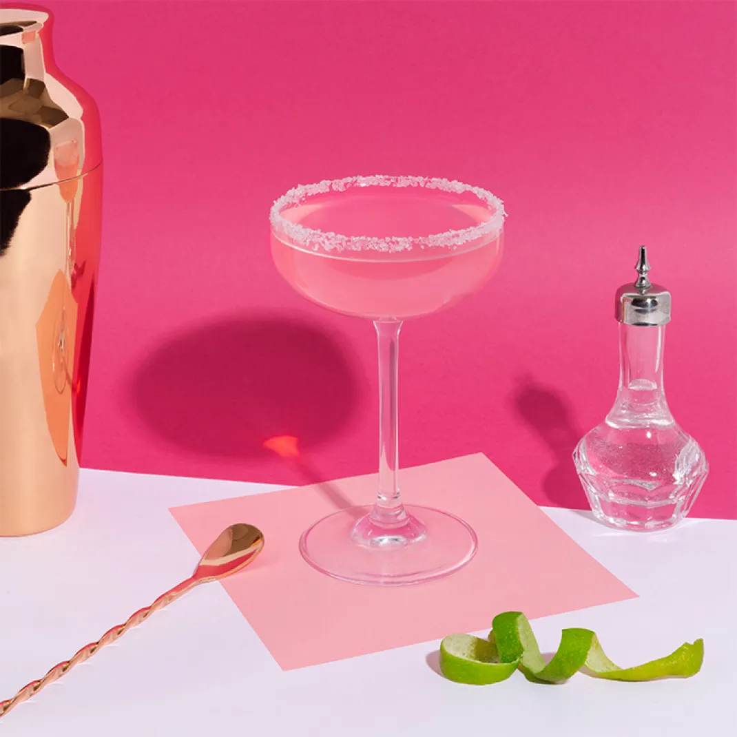 Pink Margarita in a chilled cocktail glass with a sugar rim