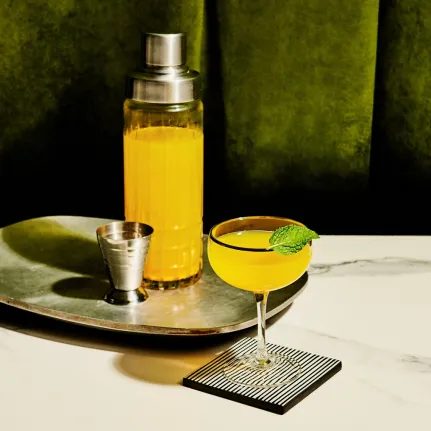 Coupe of Gold Cocktail with Cointreau
