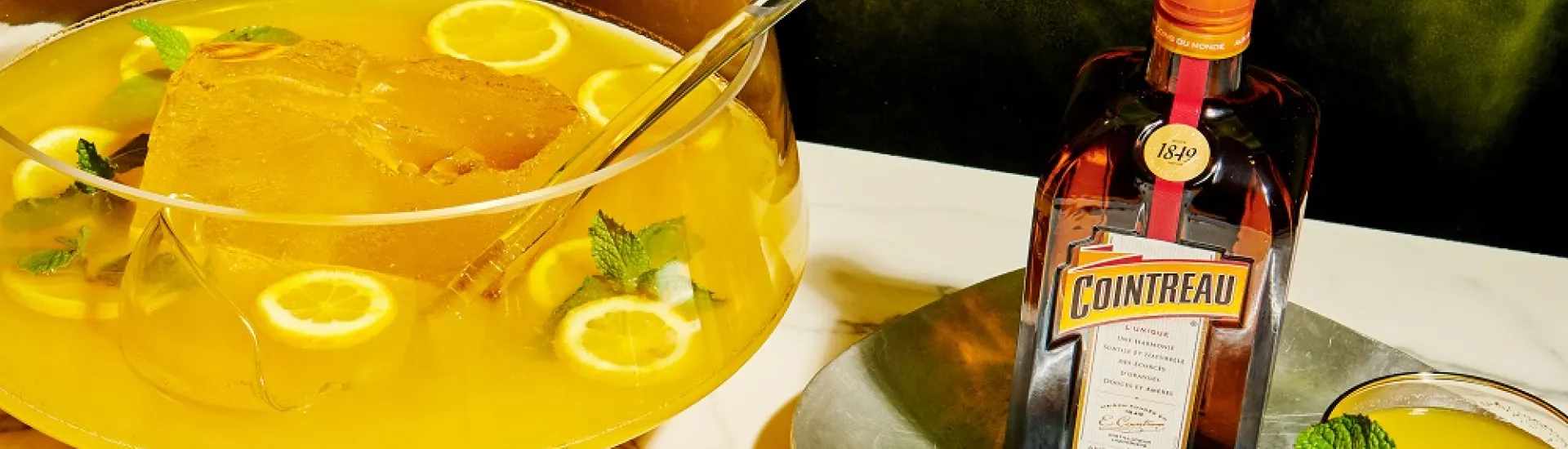 Coupe of Gold Batch Cocktail with Cointreau